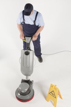 cleaning floor with machine