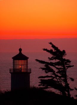 Light Shining in the North Head Lighthouse on the Washington Coast at Sunset