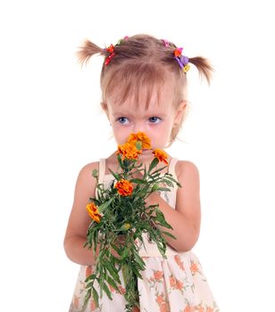 Little girl with flowers on the white background
