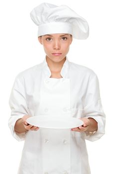 Chef disappointed and sad with empty plate. Woman chef serving empty plate looking negative and funny. Multicultural Asian Caucasian woman chef.