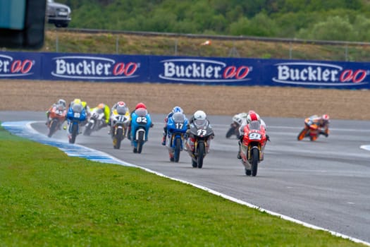 JEREZ DE LA FRONTERA, SPAIN - NOV 20: Motorbike competitors begin the 125GP - Moto3 race in the CEV Championship on November 20, 2011 in Jerez de la Frontera, Spain.