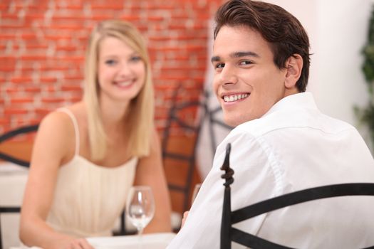 couple having a romantic dinner in a restaurant