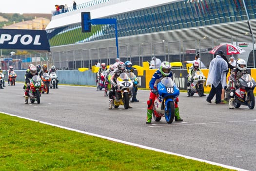 JEREZ DE LA FRONTERA, SPAIN - NOV 20: Motorbike competitors begin the 125GP - Moto3 race in the CEV Championship on November 20, 2011 in Jerez de la Frontera, Spain.