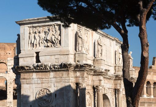 Detail of arch of Constantine and Colosseum in Ancient Rome