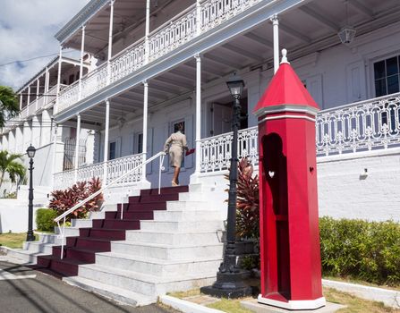 CHARLOTTE AMALIE,ST THOMAS,USVI - FEBRUARY 21: Woman enters Government House in Charlotte Amalie on February 21, 2013. The US Virgin Islands first elected a Governor in 1970