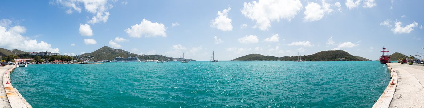 Panoramic view of Charlotte Amalie harbor with ships and boats taken from promenade