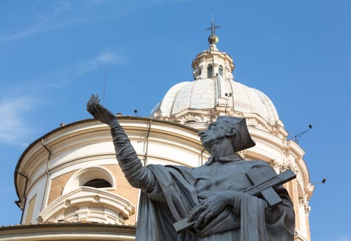 Detail of statue by dome on church of San Carlo al Corso in Rome Italy