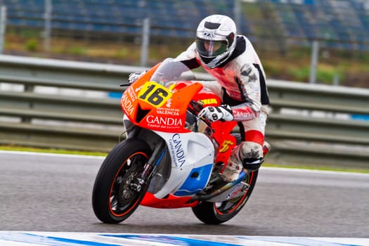 JEREZ DE LA FRONTERA, SPAIN - NOV 19: Moto2 motorcyclist Oscar Climent takes a curve in the CEV Championship race on November 19, 2011 in Jerez de la Frontera, Spain.