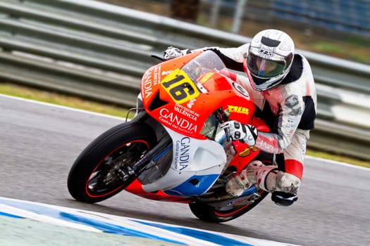 JEREZ DE LA FRONTERA, SPAIN - NOV 19: Moto2 motorcyclist Oscar Climent takes a curve in the CEV Championship race on November 19, 2011 in Jerez de la Frontera, Spain.