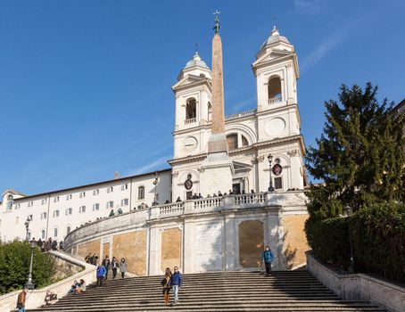 ROME, ITALY - JANUARY 27: Tourists sitting on Spanish Steps in Rome on January 27, 2013. The 138 steps were renovated in 1995