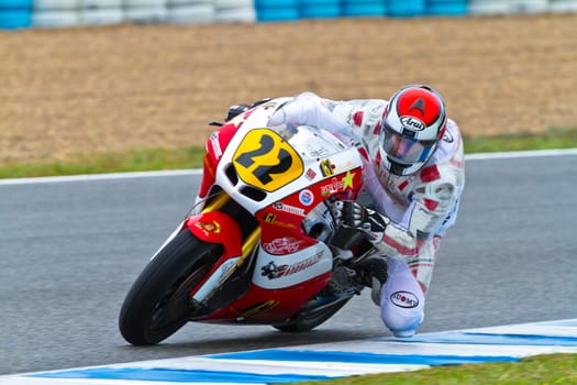 JEREZ DE LA FRONTERA, SPAIN - NOV 19: Moto2 motorcyclist Alessandro Andreozzi takes a curve in the CEV Championship race on November 19, 2011 in Jerez de la Frontera, Spain.