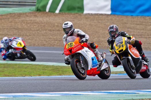 JEREZ DE LA FRONTERA, SPAIN - NOV 19: Moto2 motorcyclist Climent (16) and Morales (31) take a curve in the CEV Championship race on November 19, 2011 in Jerez de la Frontera, Spain.