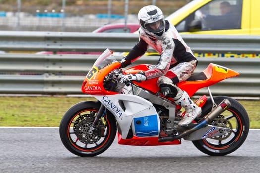JEREZ DE LA FRONTERA, SPAIN - NOV 19: Moto2 motorcyclist Oscar Climent races in the CEV Championship race on November 19, 2011 in Jerez de la Frontera, Spain.