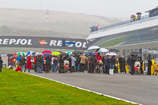 JEREZ DE LA FRONTERA, SPAIN - NOV 20: Motorbike competitors begin the Moto2 race in the CEV Championship on November 20, 2011 in Jerez de la Frontera, Spain.