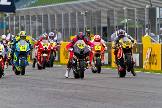 JEREZ DE LA FRONTERA, SPAIN - NOV 20: Motorbike competitors begin the Moto2 race in the CEV Championship on November 20, 2011 in Jerez de la Frontera, Spain.