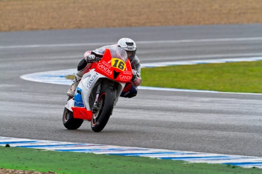 JEREZ DE LA FRONTERA, SPAIN - NOV 20: Moto2 motorcyclist Oscar Climent races in the CEV Championship race on November 20, 2011 in Jerez de la Frontera, Spain.
