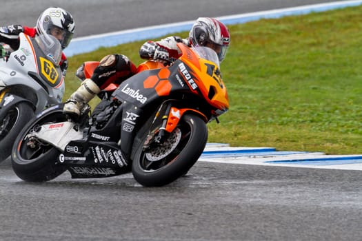JEREZ DE LA FRONTERA, SPAIN - NOV 20: Moto2 motorcyclist Tirado (15) and Ramirez (68) take a curve in the CEV Championship race on November 20, 2011 in Jerez de la Frontera, Spain.