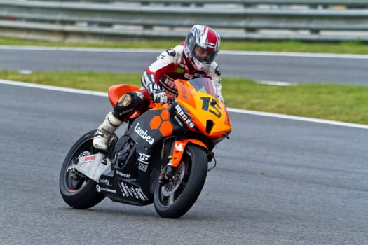 JEREZ DE LA FRONTERA, SPAIN - NOV 20: Moto2 motorcyclist Manuel Tirado takes a curve in the CEV Championship race on November 20, 2011 in Jerez de la Frontera, Spain.