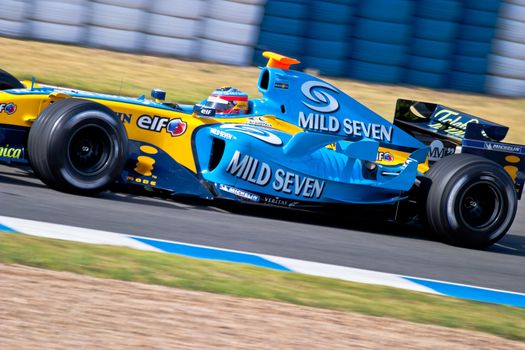 JEREZ DE LA FRONTERA, SPAIN - JUN 22: Fernando Alonso of Renault F1 races on training session on  June 22 , 2005, in Jerez de la Frontera , Spain