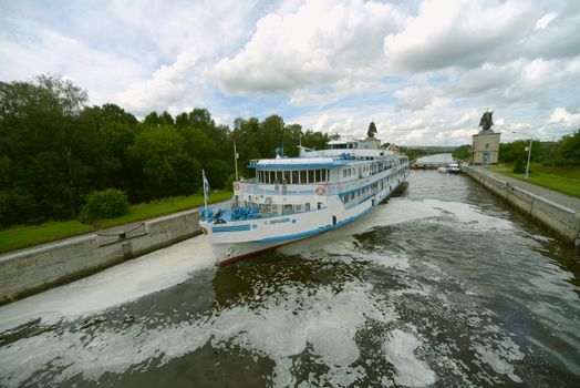 Moscow canal, Russia. Cruise ship in tre river lock - July 2012.