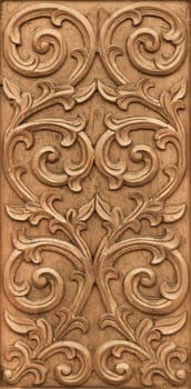 Pattern of flower carved on wood background