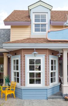 Classic exterior with chair and white window