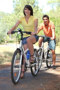 Couple on a bike ride in the countryside