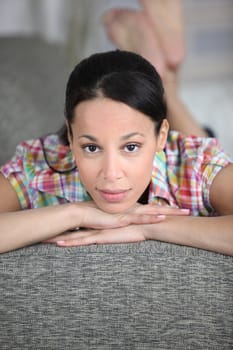 damsel lying on settee