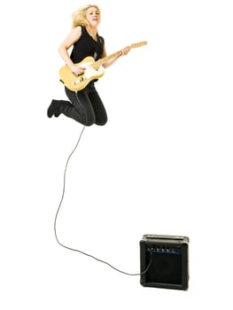 Young woman playing electric guitar isolated on white background