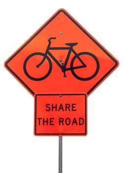 share the road with bicycles - orange traffic warning sign isolated on white