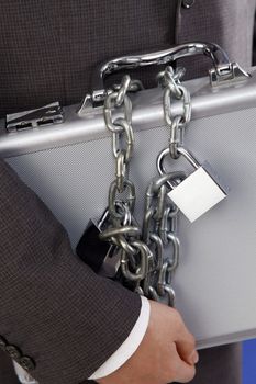 man holding the brief case with extra lock