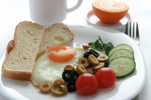 fried eggs with vegetables