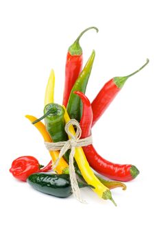 Bunch of Chili Peppers with Yellow Santa Fee, Red Habanero, Green Jalapeno, Green and Red Peppers isolated on white background