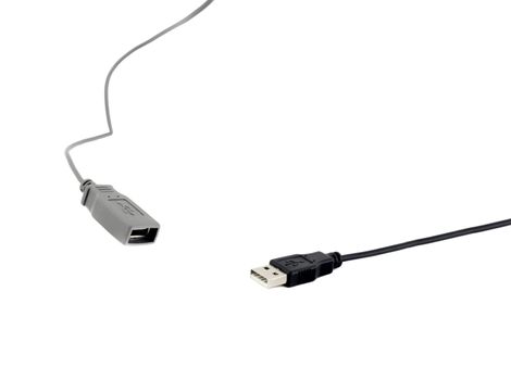 Isolated black and white USB cables on white background.