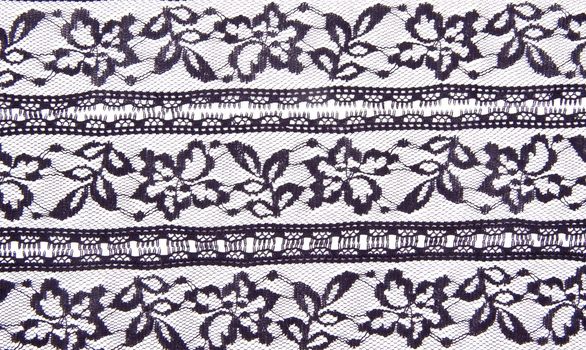 White textile background with stylized flowers pattern