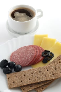 toasts with salami and cheese and coffee