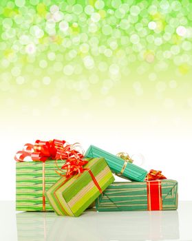 Christmas presents against bokeh background