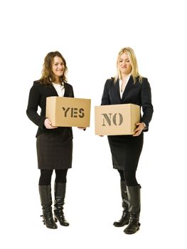 Two women with Cardboard boxes isolated on white background