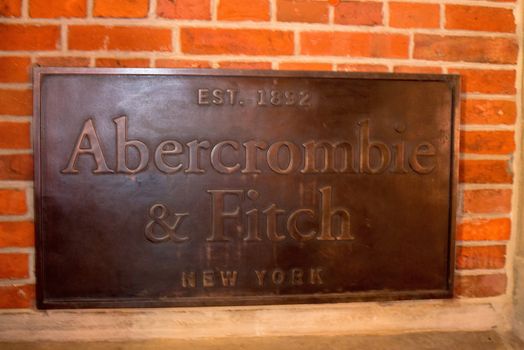 HAMBURG - DECEMBER 1, 2012: Plaque at the entrance of the newly opened Abercrombie & Fitch flagship store on December 1, 2012 in Hamburg Germany. Abercrombie & Fitch was founded 1892 in New Albany in the US and currently runs more than 1.000 stores worldwide including their second brand Hollister.