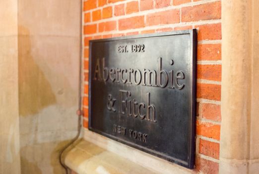 HAMBURG - DECEMBER 1, 2012: Plaque at the entrance of the newly opened Abercrombie & Fitch flagship store on December 1, 2012 in Hamburg Germany. Abercrombie & Fitch was founded 1892 in New Albany in the US and currently runs more than 1.000 stores worldwide including their second brand Hollister.