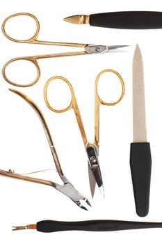 A set of metallic manicure tools.