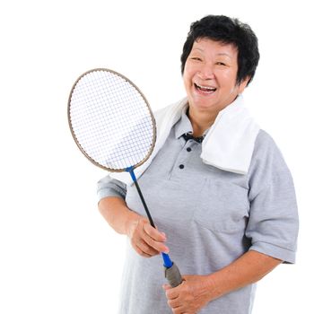 Asian senior woman healthy lifestyle. Happy Asian grandparent holding badminton racket isolated on white.