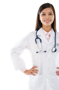 Attractive Southeast Asian female medical doctor standing isolated on white background.