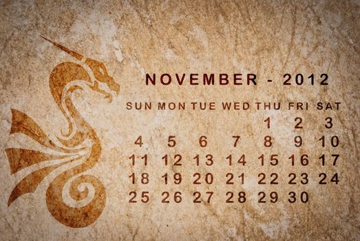 2012 year of the Dragon calendar on old vintage paper, November
