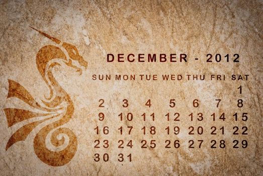 2012 year of the Dragon calendar on old vintage paper, December