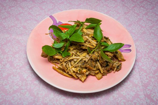 A northern Thai (Lanna) salad made with boiled bamboo shoots and a thick paste made from the rice paddy crabs decorated by herb. This food menu is the appetizer local salad which Thai local Lanna people think of when talking about bamboo shoots. 