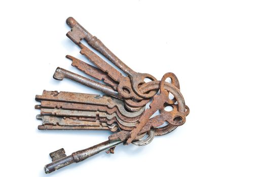 Old keys in isolated white background
