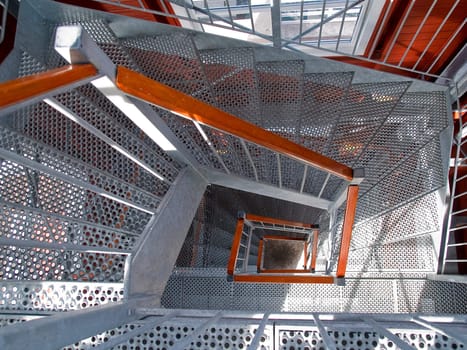 Modern emergency escape staircase stairwell made of metal