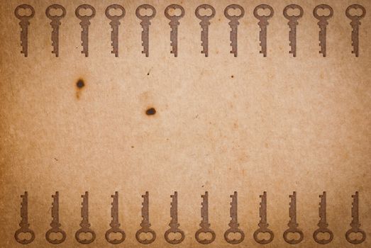 Rusty keys on old paper background with blended layers
