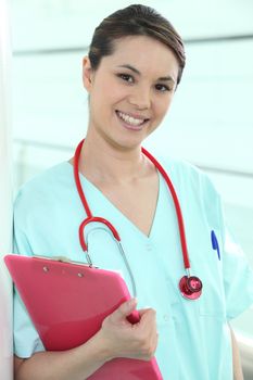 Female medic with a clipboard